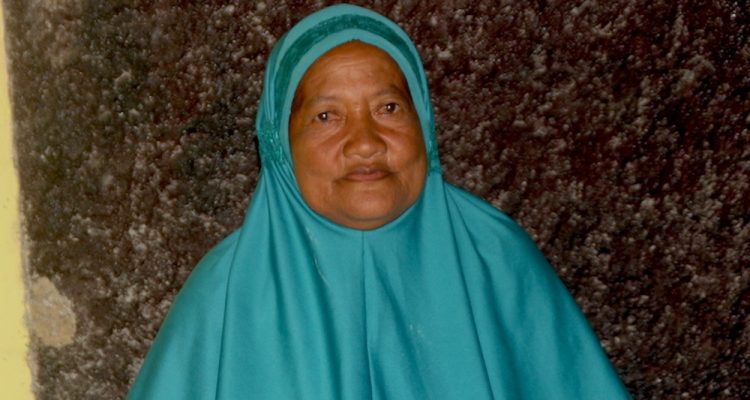 Yani, the 59-year ld villager of Gane Dalam whose land is part of the pal oil concession owned by PT GMM. (Hairil Hiar)